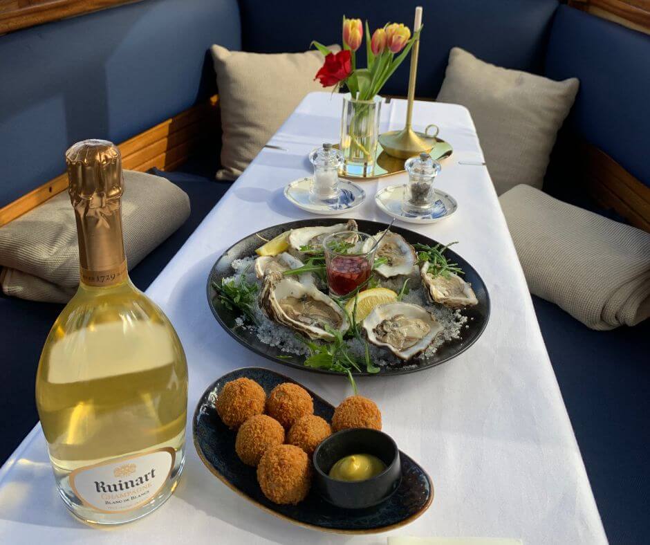 Traditional Dutch food and drinks while boa tour