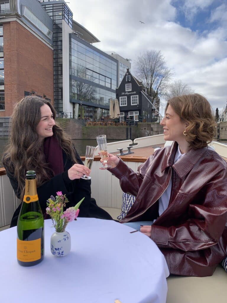 luxury canal cruise Amsterdam with champagne at sunset