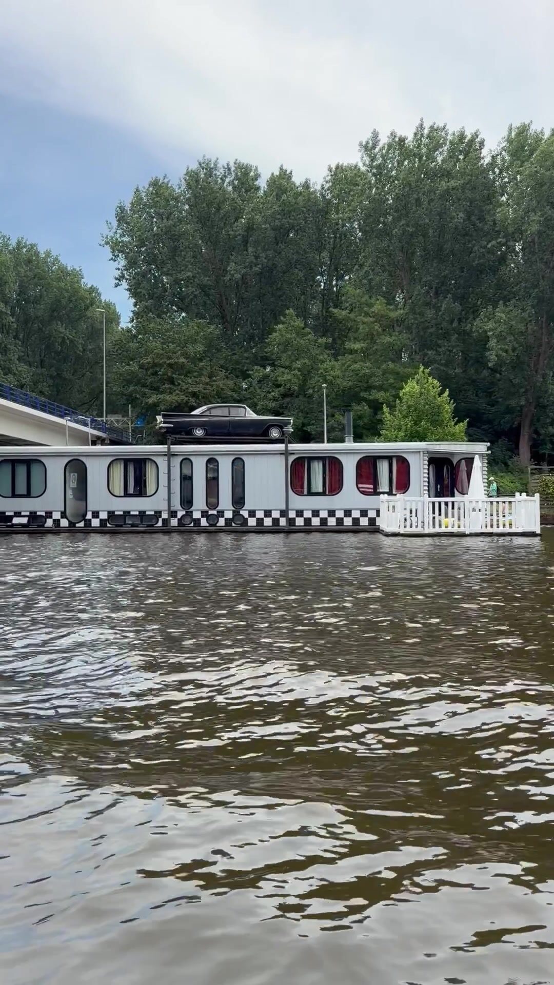 Waterside villa on the Amstel River viewed from a private countryside boat tour near Amsterdam