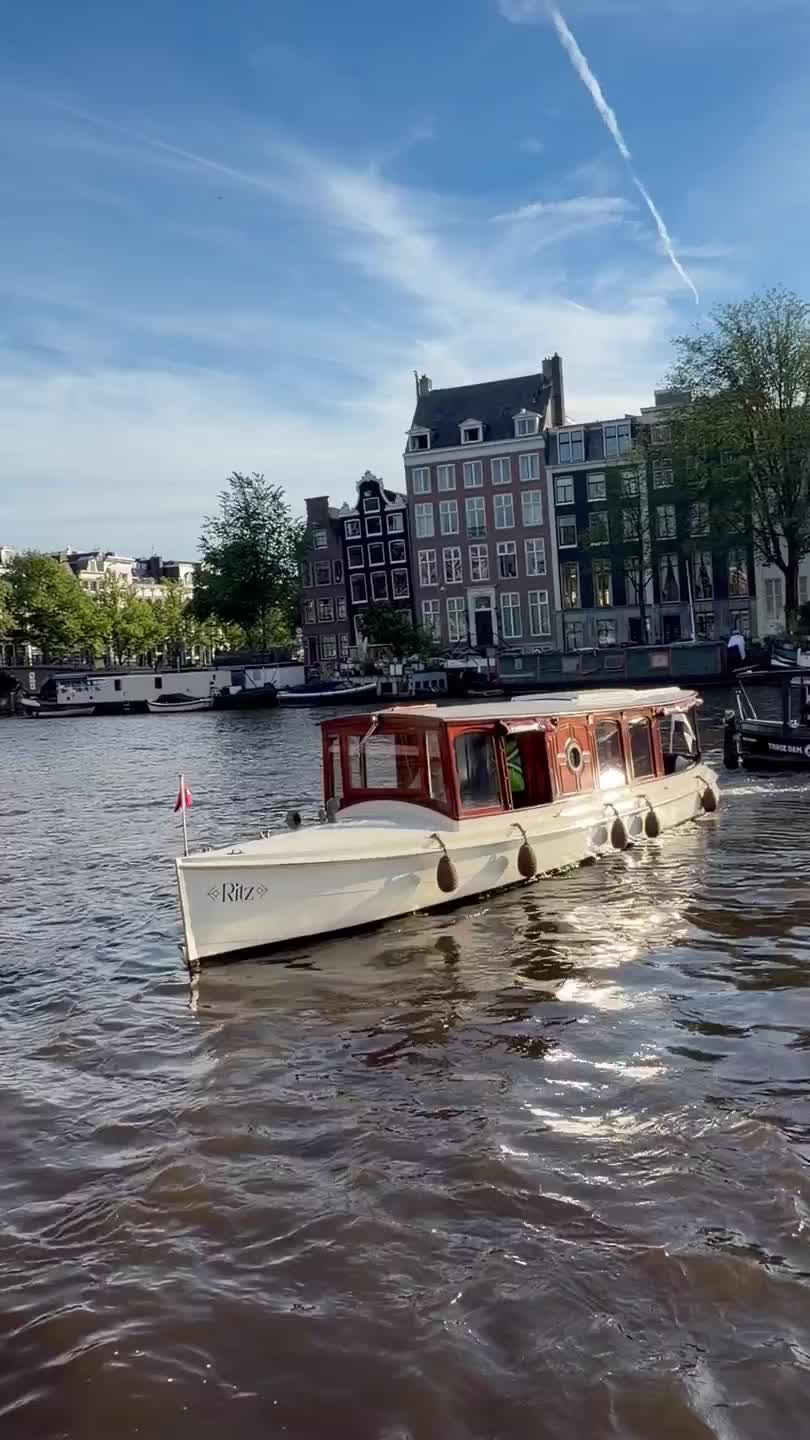 Ritz private boat rental Amsterdam, up to 12 guests, mahogany interior with restroom on board