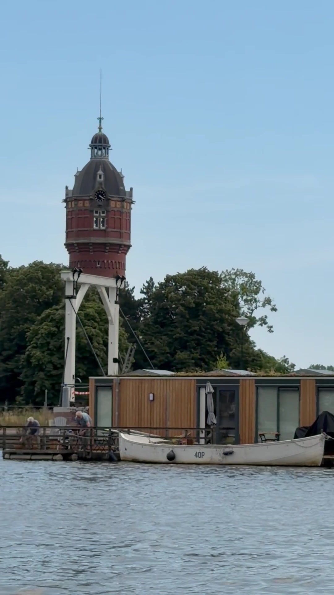 Scenic villa along a relaxed stretch of the Amstel River during a private Amsterdam boat cruise