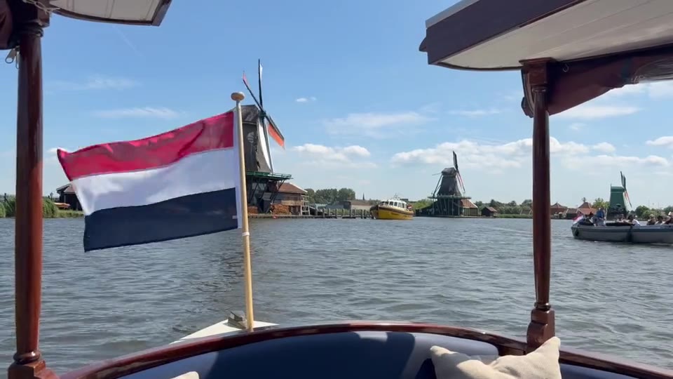 Zaanse Schans windmills seen from a private boat