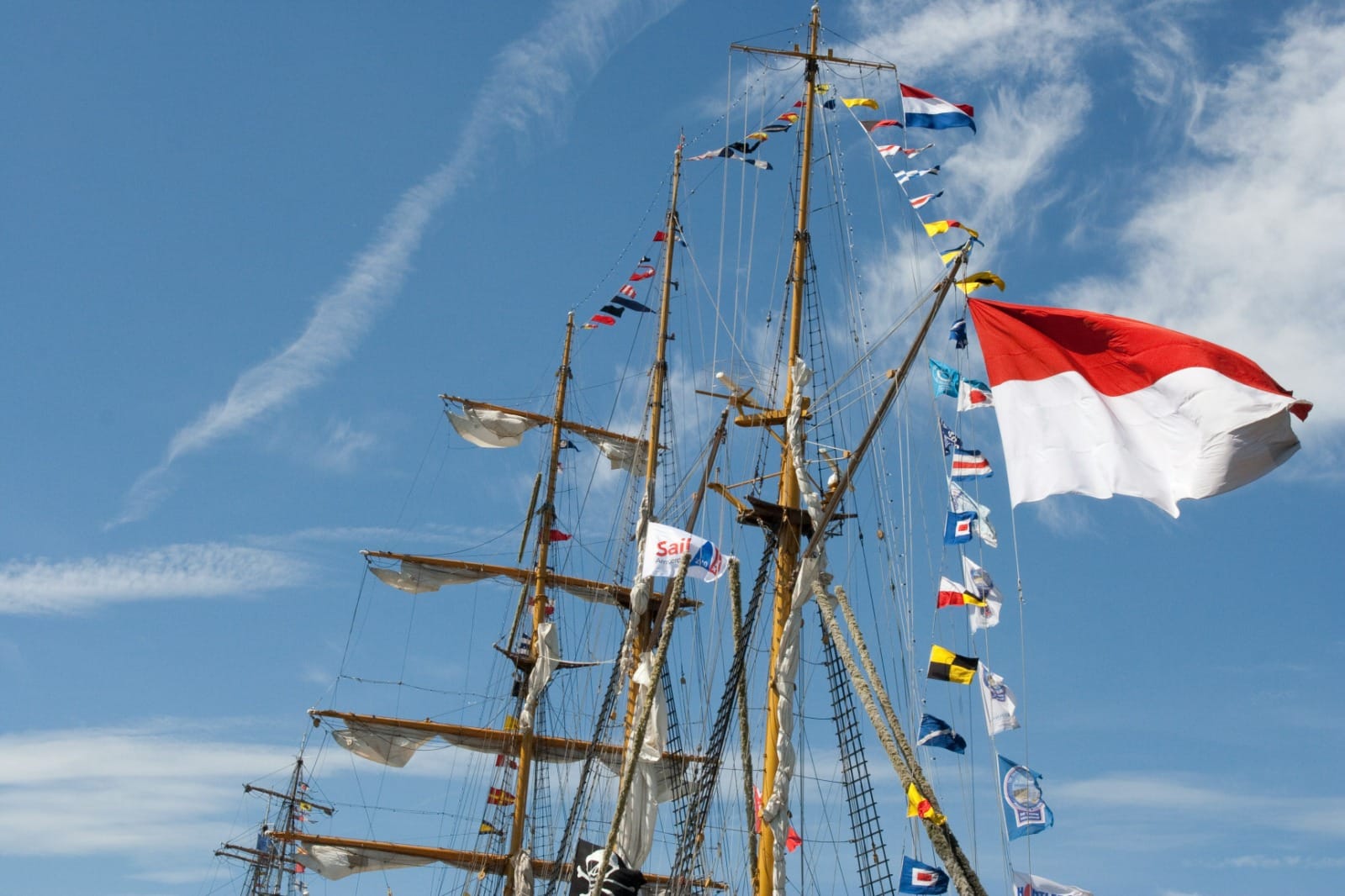 Tall ships moored along the quays during SAIL Amsterdam